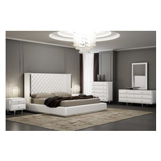 tufted grey bed