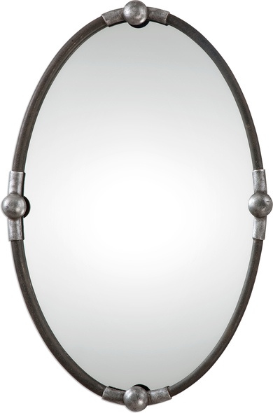 framed mirror wall Uttermost Black Oval Mirror Iron Frame Finished In A Rust Black Accented With Burnished Silver Details.