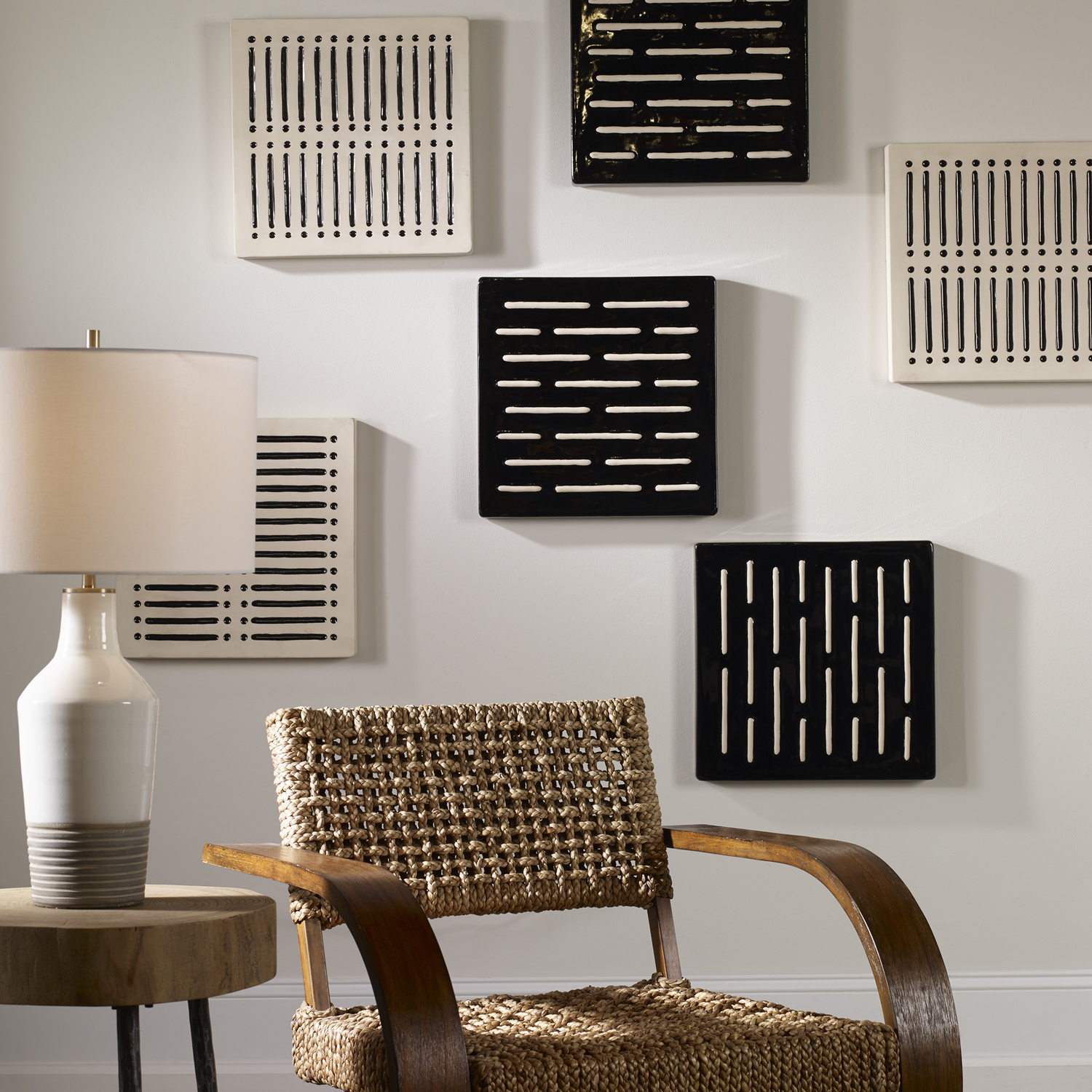 cool art for home Uttermost Modern Wall Art Update Your Space With These Modern Earthenware Wall Squares. Each Are Glazed In An Inverse Matte Ivory And Gloss Black Palette With Noticeable Scandinavian Style Influence. Each Panel May Be Hung Horizontal Or Vertical, Allowing Multiple Wall Design Options.