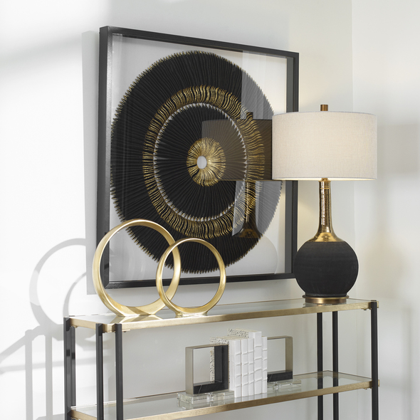 glass wall decor for living room Uttermost Framed Wall Art Handcrafted By Skilled Artisans, This Wall Decor Features A Striking Black And Gold Leaf Medallion. Artwork Is Set Against A White Linen Backing In A Black Shadowbox Style Pine Wood Frame Under Glass.