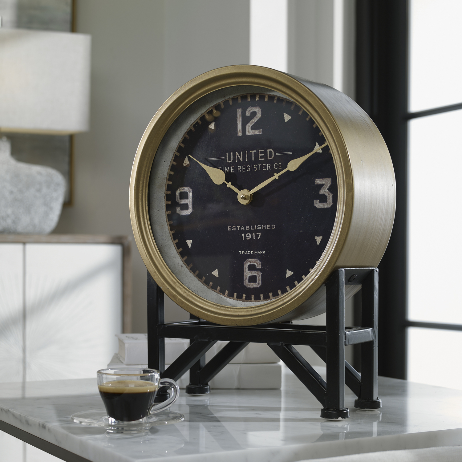 27 in wall clock Uttermost Table Clocks Brass Finished Metal With Aged Black Details. Quartz Movement Ensures Accurate Timekeeping. Requires One "AA" Battery. Steve Kowalski