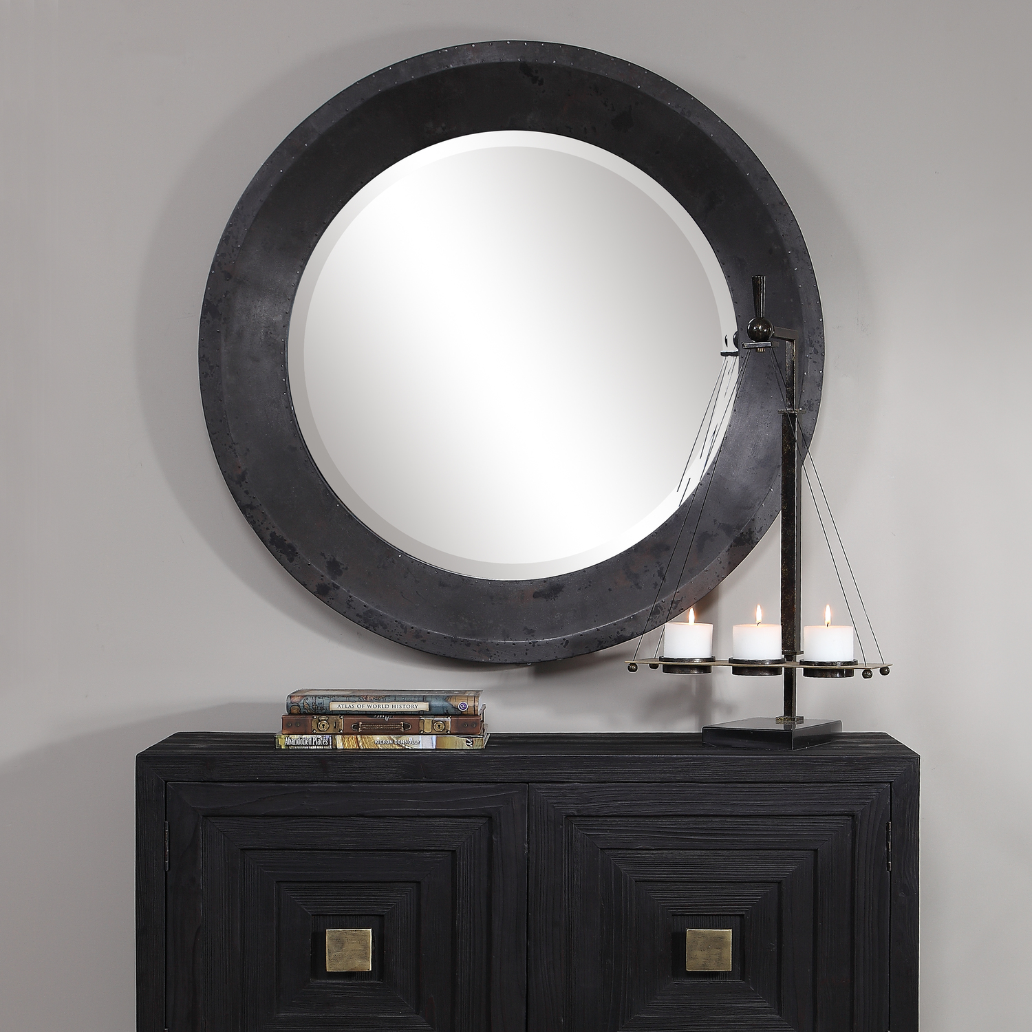 mirror furniture design Uttermost Round Mirror Showcasing An Industrial Style, This Round Mirror Is Paired With An Oxidized Metal Frame In Dark Gray, Silver, Charcoal, And Rust Tones With Nail Accents. A Generous 1 1/4" Bevel Completes This Piece.