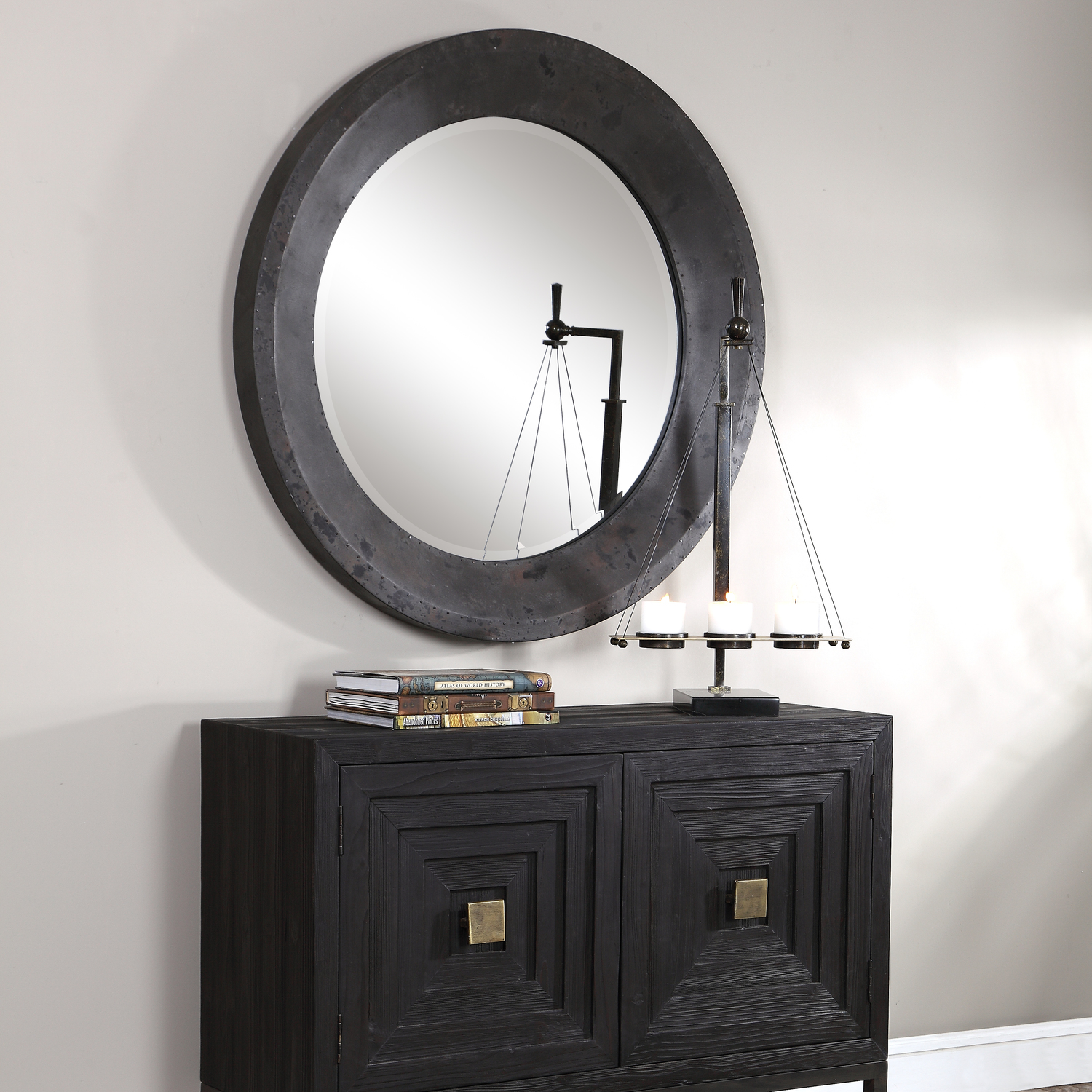 mirror furniture design Uttermost Round Mirror Showcasing An Industrial Style, This Round Mirror Is Paired With An Oxidized Metal Frame In Dark Gray, Silver, Charcoal, And Rust Tones With Nail Accents. A Generous 1 1/4" Bevel Completes This Piece.