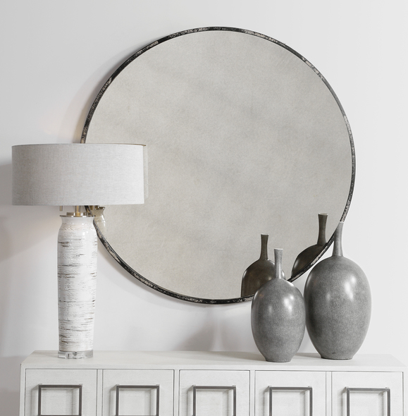 wood framed round wall mirror Uttermost Industrial Round Mirror Industrial Style Round Mirror Features A Petite Metal Frame Finished In Rustic Black With Aged White Distressing, Surrounding An Antique Style Mirror.