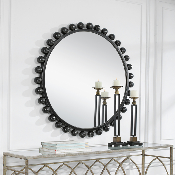 rustic decorative mirrors Uttermost Black Round Mirror This Eye-catching Round Mirror Adds An Upscale Look And Sophisticated Style To Any Room By Showcasing Smooth Iron Spheres That Embellish A Sleek Inner Frame, Finished In A Distressed Black With Subtle Silver Undertones.