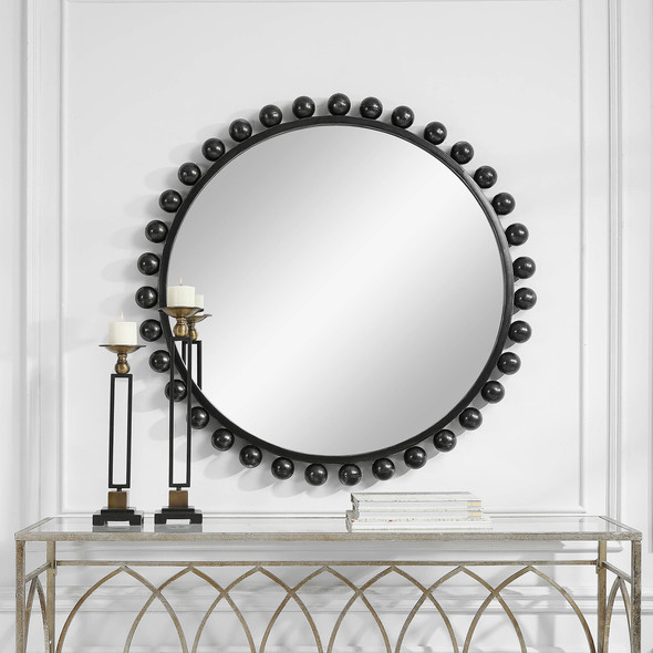 rustic decorative mirrors Uttermost Black Round Mirror This Eye-catching Round Mirror Adds An Upscale Look And Sophisticated Style To Any Room By Showcasing Smooth Iron Spheres That Embellish A Sleek Inner Frame, Finished In A Distressed Black With Subtle Silver Undertones.