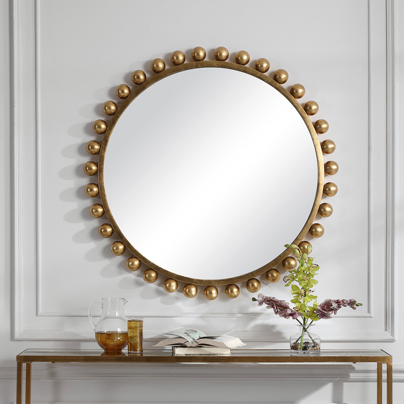 crystal mirror design Uttermost Gold Round Mirror This Eye Catching Round Mirror Adds An Upscale Look And Sophisticated Style To Any Room By Showcasing Smooth Iron Spheres That Embellish A Sleek Inner Frame, Finished In A Clean Metallic Gold Leaf.
