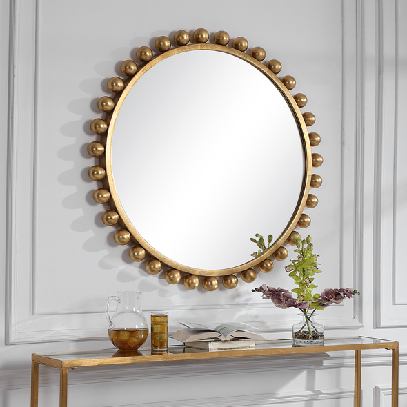 crystal mirror design Uttermost Gold Round Mirror This Eye Catching Round Mirror Adds An Upscale Look And Sophisticated Style To Any Room By Showcasing Smooth Iron Spheres That Embellish A Sleek Inner Frame, Finished In A Clean Metallic Gold Leaf.