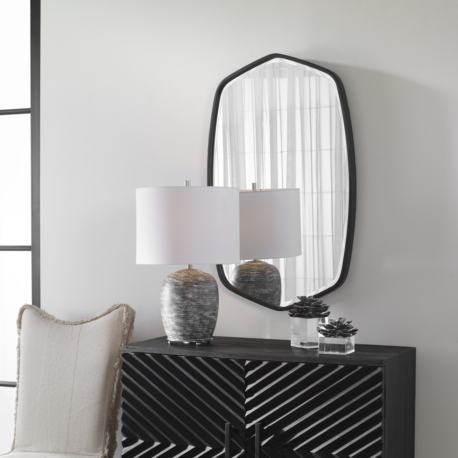 decorative mirror lights Uttermost Black Iron Mirror This Hand Forged Iron Mirror Frame Features A Unique Shape With Elegant Curves, Finished In A Streamlined Satin Black. Mirror Has A Generous 1 1/4" Bevel.