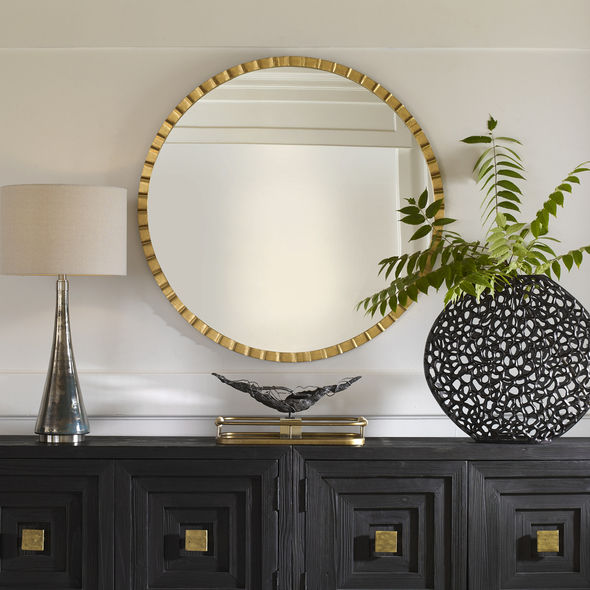 designer decorative mirrors Uttermost Gold Round Mirror Constructed From Hand Forged Iron With Noticeable Raised Ridges For A Touch Of Industrial Influence, Finished In A Metallic Gold Leaf Finish With Light Distressing.