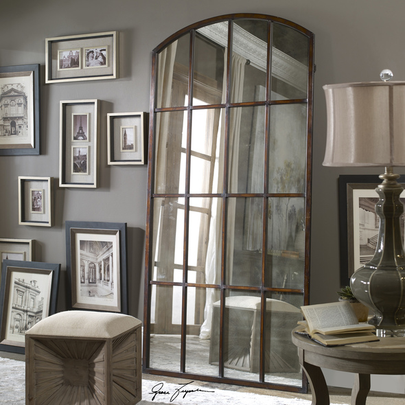 mirror room design Uttermost Metal Arch Mirrors This Oversized Arch Features A Forged Iron Frame In A Hand Applied Warm Bronze Finish With Burnished Distressing Encasing An Antique Style Mirror.