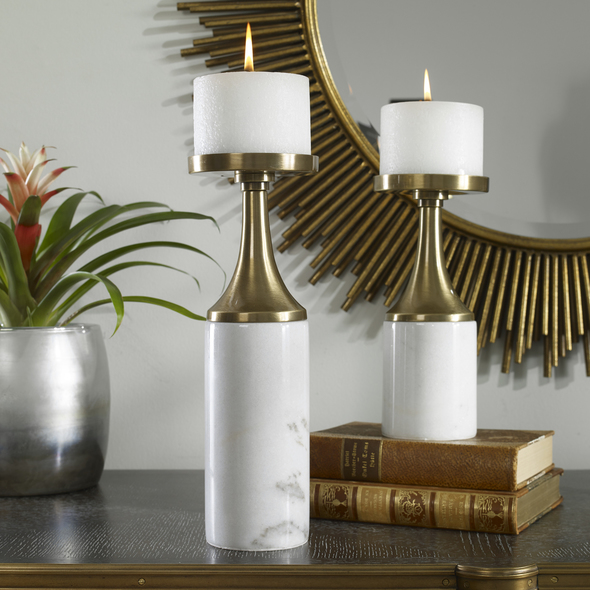 cheap candle holders Uttermost Candleholder Candleholders Set Of Two Candleholders Feature An Antique Brushed Brass Finish And An Elegant White Marble Foot. Two 4"x 3" Off-white Distressed Candles Included. 
Sizes: Sm-5x10x5, Lg-5x13x5