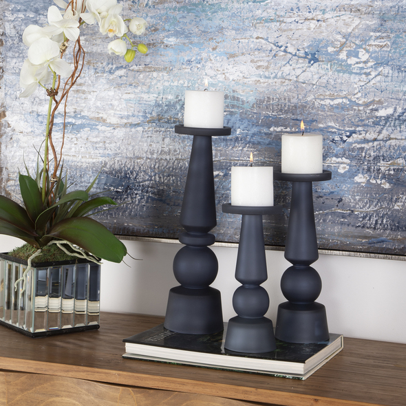 set of 3 glass hurricane candle holders Uttermost Candleholders Set Of Three Candleholders Showcase Traditional Silhouettes And Are Made From A Deep, Midnight Blue Glass With Three 3"x 3" White Candles Included. Sizes: S-4x10x4, M-4x12x4, L-5x15x5