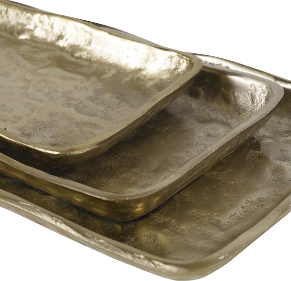 unique accent pieces Uttermost Trays Set Of Three Cast Aluminum Trays Displays Organic Edges With A Heavily Textured Light Antique Gold Finish. Sizes: S-15x1x5, M-20x1x6, L-24x1x8