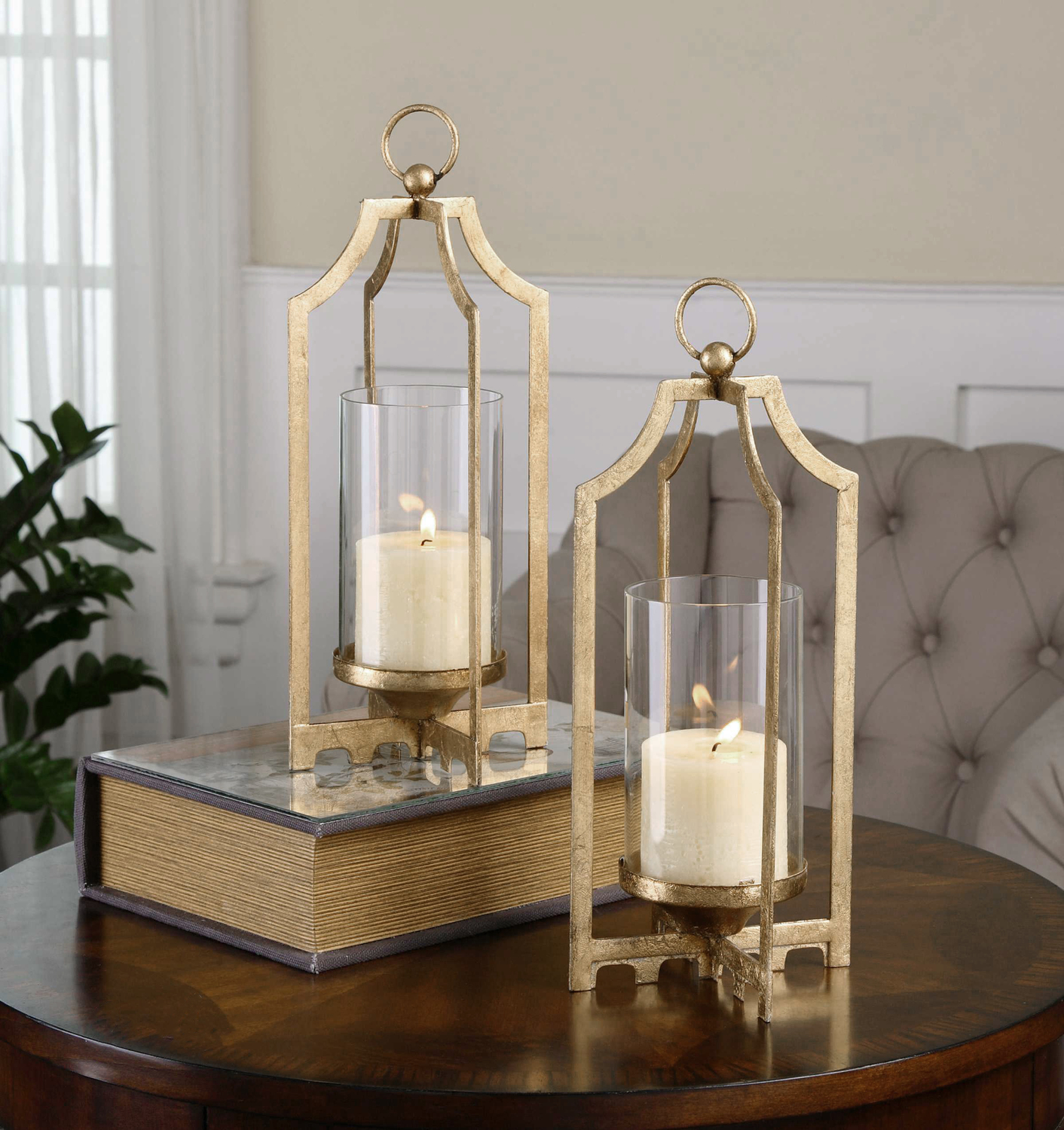 pillar candle holders set of 2 Uttermost Candleholders Bright Metallic Gold With Clear Glass Globes And Distressed White Candles.