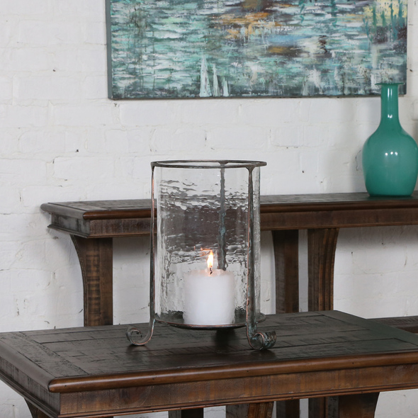 tall glass votive holders Uttermost Candleholders Tarnished Copper Bronze Finish With A Clear Hammered Glass Globe And White Candle.