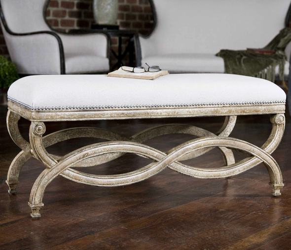 upholstered small bench Uttermost Benches Hand Carved, White Mahogany Frame With Antiqued Almond Finish. Covering Is Natural Linen And Cotton With Teflon(r) Fabric Protector Accented With Champagne Silver Nails. Carolyn Kinder
