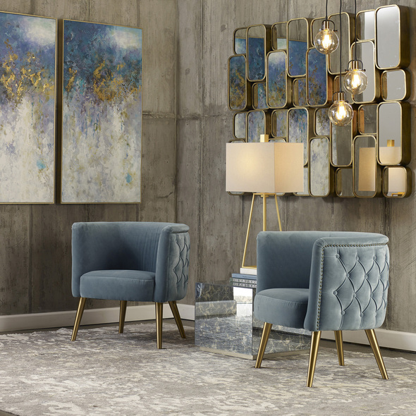leather chair with arms Uttermost  Accent Chairs & Armchairs This Stylish Barrel Chair Features A Plush Diamond Button Tufted Outside In A Luxurious Slate Blue Velvet Lined With Antique Brass Nail Head Trim, On Metal Tapered Dowel Legs Finished In Brushed Brass. Seat Height Is 19".