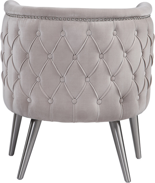 unique accent chairs for living room Uttermost  Accent Chairs & Armchairs This Stylish Barrel Chair Features A Plush Diamond Button Tufted Outside In A Luxurious Champagne Velvet, Lined With Antique Nickel Nail Head Trim, On Metal Tapered Dowel Legs Finished In Brushed Nickel. Seat Height Is 19".
