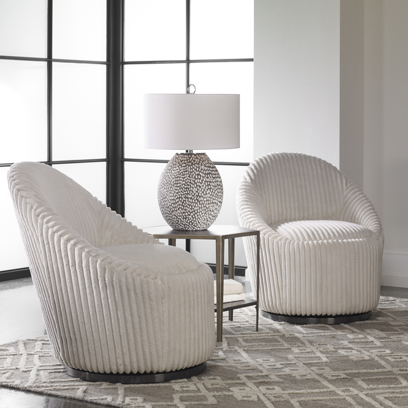 eames chair comfortable Uttermost Accent Chairs & Armchairs A Blend Of Contemporary And Feminine Styles, This Chair Is Upholstered In A Luxurious Fluted Ivory Chenille Fabric And Is Accented By A Stainless Steel Swivel Base Finished In Brushed Black Nickel. Seat Height Is 19".
