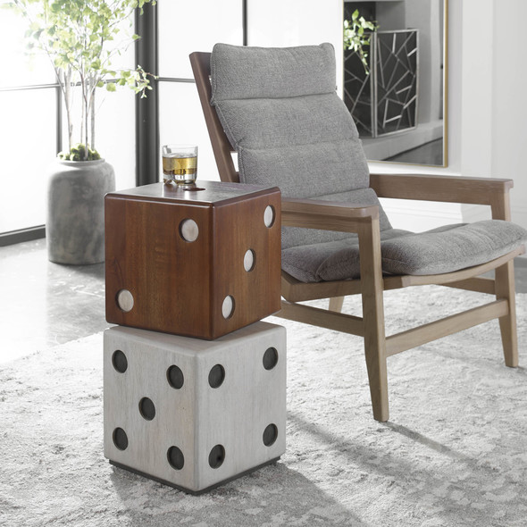 corner of a table Uttermost Accent & End Tables This Asymmetrical Stacked Dice Accent Adds A Playful Touch To Your Game Room Decor. Each Layer Is Constructed From Solid Suar Wood In Natural Wood Tone And Whitewashed Finishes With Distressed Ebony And White Accents.