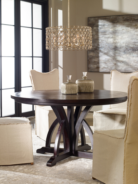 round table and four chairs Uttermost  Dining Table Soft, Weathered Black Finish On Solid Mango Wood Arched Motif Base, With Rub-through Distressing On The Mindi Veneer Inlay Top.