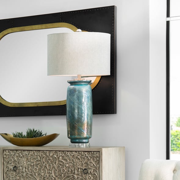 Uttermost Olesya Swirl Glass Table Lamp Table Lamps This Table Lamp Features A Decorative Glass Base That Showcases A Unique Swirl Texture, Highlighting Shades Of Ocean Blues And Metallic Bronze. Accenting These Vibrant Colors Are Brushed Nickel Plated Details And A Thick Crystal Foot.