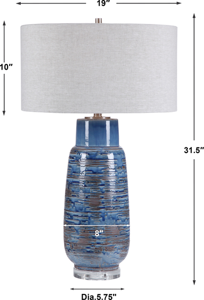  Uttermost Blue Table Lamp Table Lamps This Table Lamp Features A Tall Ceramic Base In A Heavily Distressed Aged Indigo Blue Drip Glaze With Dark Rust Bronze Undertones. A Thick Crystal Foot And Brushed Nickel Plated Accents Highlight The Piece.