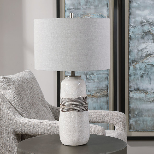 black and gold sconces Uttermost White Crackle Table Lamp Showcasing A Rustic Casual Look, This Ceramic Table Lamp Features An Off-white Crackle Glaze With Distressed Rust Brown Details And Noticeable Ribbed Texture, Paired With Plated Brushed Nickel Accents.