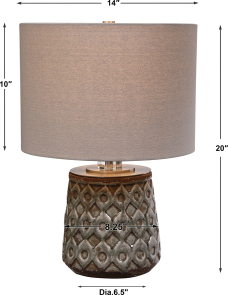 the lamp is on the desk Uttermost Old World Table Lamp A Transitional Take On An Old-world Look, This Ceramic Table Lamp Features A Heavily Distressed Blue-gray Crackle Glaze With Intricate Embossed Geometric Details, Accented With Brushed Nickel Details And A Thick Crystal Collar.