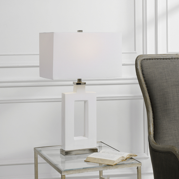 cool small desk lamps Uttermost Modern White Table Lamp Showcasing A Sleek And Contemporary Look, This Ceramic Table Lamp Is Finished In A Stark White Glaze With Striking Polished Nickel Plated Iron Details.