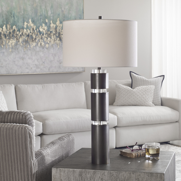 Uttermost Dark Bronze Table Lamp Table Lamps This Table Lamp Features A Sophisticated Design By Pairing Stacked Steel Columns In A Dark Bronze Finish With Elegant Crystal Details.