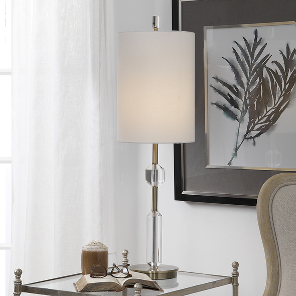 Uttermost Cut Crystal Buffet Lamp Table Lamps This Elegant Piece Showcases A Slender Profile Featuring Polished Cut Crystal Details, Paired With Plated Antique Brass Accents. A Round Hardback Drum Shade In White Linen Fabric Completes This Sophisticated Design.