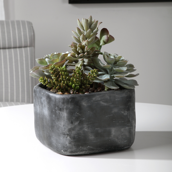 decorative boxwood Uttermost Artificial Flowers / Centerpiece A Contemporary Desert Garden Mix Of Succulents Accented With An Arid Bed Of Natural Pebbles In A Mottled Charcoal Gray Concrete Planter.