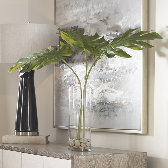 silk floral bouquets Uttermost Botanicals Contemporary Split Leaf Palm Trio Artfully Arranged In A Clear Glass Cylinder Vase With Natural Stones And Faux Water.
