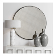 wood framed round wall mirror Uttermost Industrial Round Mirror Industrial Style Round Mirror Features A Petite Metal Frame Finished In Rustic Black With Aged White Distressing, Surrounding An Antique Style Mirror.