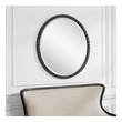multi mirror Uttermost Round Industrial Mirror Constructed From Hand Forged Iron With Noticeable Raised Ridges For A Touch Of Industrial Influence, Finished In A Slightly Distressed Matte Black With Silver Undertones.