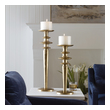 wall votive holder Uttermost Candleholders Candleholders Set Of Two Cast Aluminum Candleholders Display A Traditional Silhouette, Finished In Light Antique Gold. Includes Two 5"x 4" White Candles. Sizes: S-7x20x7, L-7x26x7