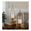 pillar candle holders set of 2 Uttermost Candleholders Bright Metallic Gold With Clear Glass Globes And Distressed White Candles.