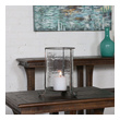 tall glass votive holders Uttermost Candleholders Tarnished Copper Bronze Finish With A Clear Hammered Glass Globe And White Candle.