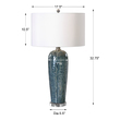 night table lamp for bedroom Uttermost Blue Ceramic Table Lamp Heathered Blue Ceramic Featuring Subtle Decorative Embossing With Silver Ivory Highlights And Rust Undertones Accented With Brushed Nickel Details And A Crystal Foot.